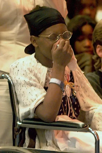 Image: a-picture-containing-person-indoor-seated-descr (620×923 41.2 KB)