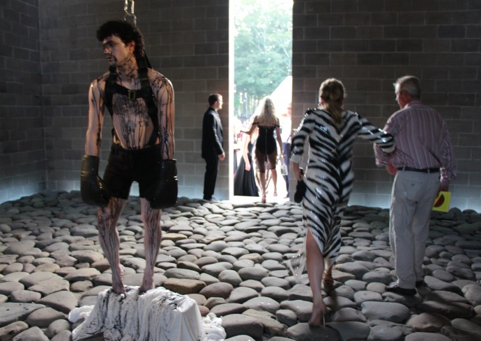 Image: transgressive-performance-art-devils-heaven-watermill-center-torture-victim-hangs-from-metal-chains-as-millionaires-look-on (690×490 82.8 KB) Image: transgressive-performance-art-devils-heaven-watermill-center-torture-victim-hangs-from-metal-chains-as-millionaires-look-on (690×490 82.8 KB)