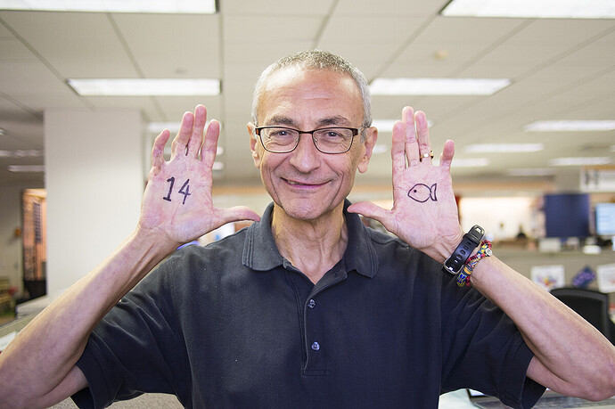 john-podesta-ritual-bloodletting-of-left-middle-finger