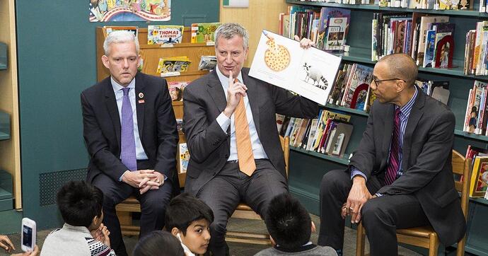 new-york-city-de-blasio-reads-secret-pizza-party-to-children